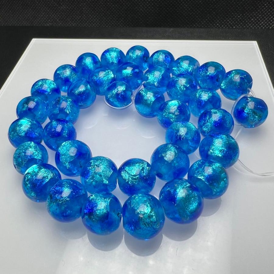 蓄光 ホタルガラス 12mm 連売り 33粒 アクアブルー とんぼ玉 とんぼ