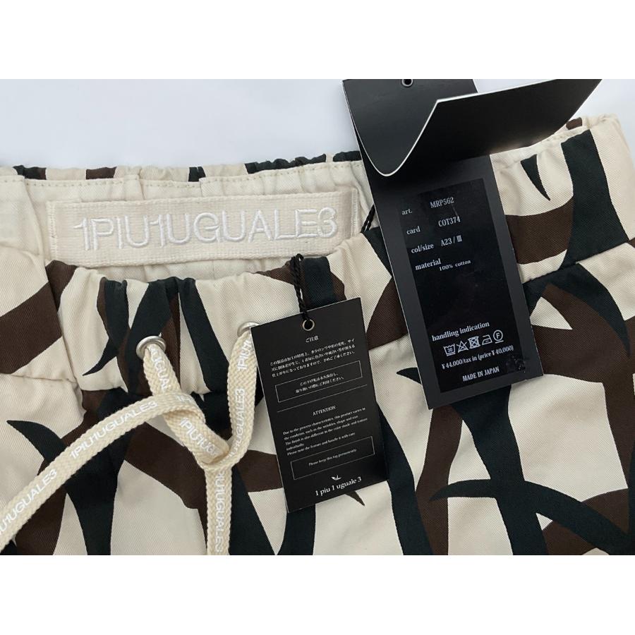 1PIU1UGUALE3 GOLF 3 ベージュ×ブラック×ブラウン トライバル柄