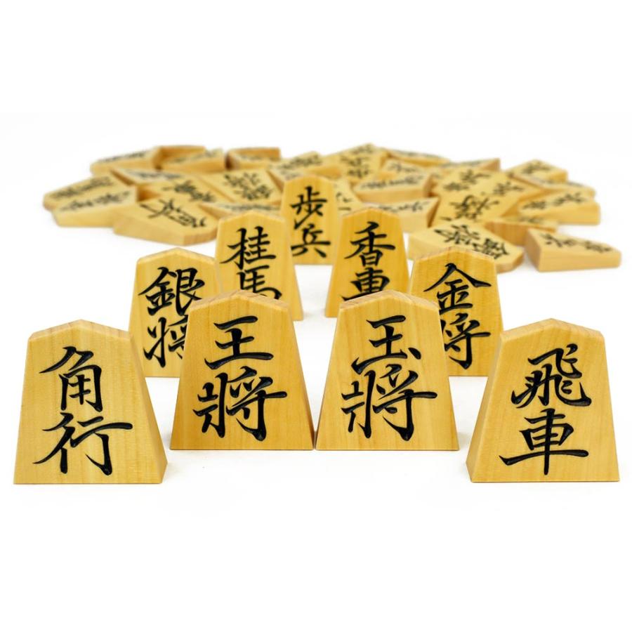 将棋駒 稚念作 御蔵島産本黄楊材 彫駒 菱湖書 面取り加工 ※桐平箱付き