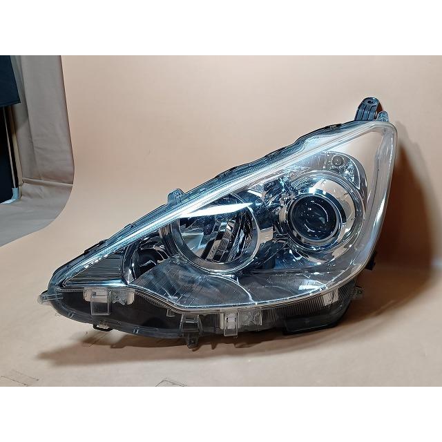 トヨタ（TOYOTA） コーティング済 アクア NHP10 左ヘッドランプ