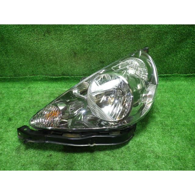 フィット LA-GD4 左ヘッドランプ/ヘッドライト T 4WD スタンレー P1680  