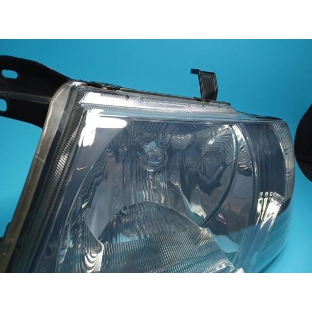 三菱（MITSUBISHI） コーティング済 パジェロ V73W 左ヘッドランプ 
