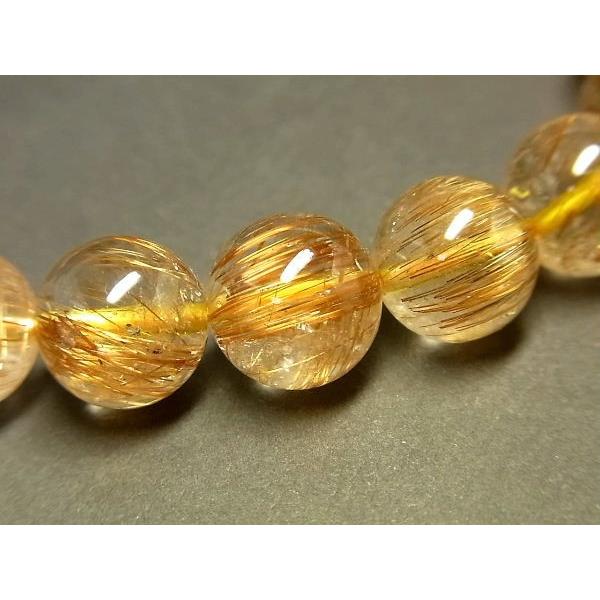 パワーストーン 天然石 最高級 高透明 キャッツアイタイチンルチル ルチルクォーツ 水晶ブレスレット 11〜11.5mm TRB1455 【Felistone】の画像