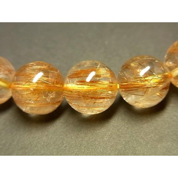 パワーストーン 天然石 最高級 高透明 キャッツアイタイチンルチル ルチルクォーツ 水晶ブレスレット 11〜11.5mm TRB1455 【Felistone】の画像