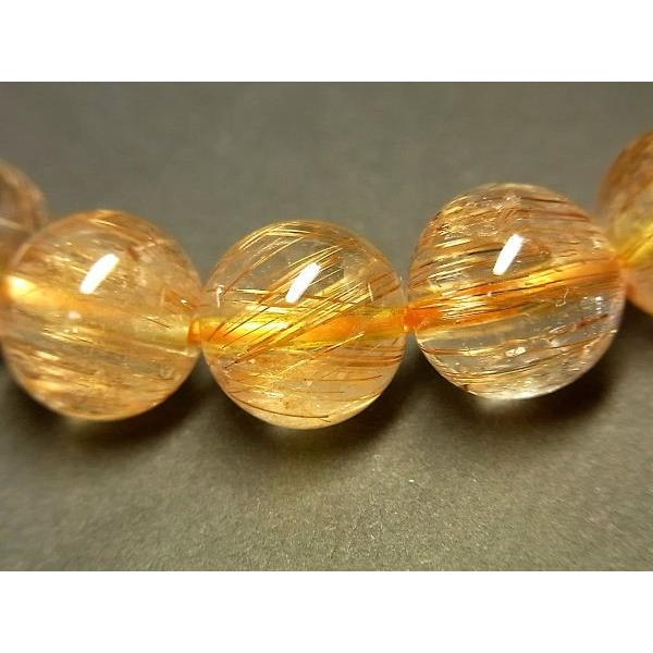 パワーストーン 天然石 最高級 高透明 キャッツアイタイチンルチル ルチルクォーツ 水晶ブレスレット 11〜11.5mm TRB1455 【Felistone】の画像