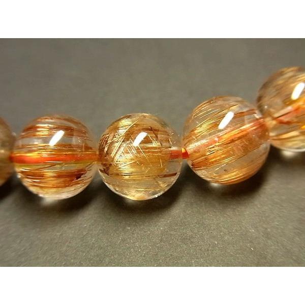 パワーストーン 天然石 最高級 高透明 ルチルクォーツ ブレスレット キャツアイタイチンルチルクォーツ 水晶ブレスレット 9.5〜10mm TRB1451 【Felistone】の画像