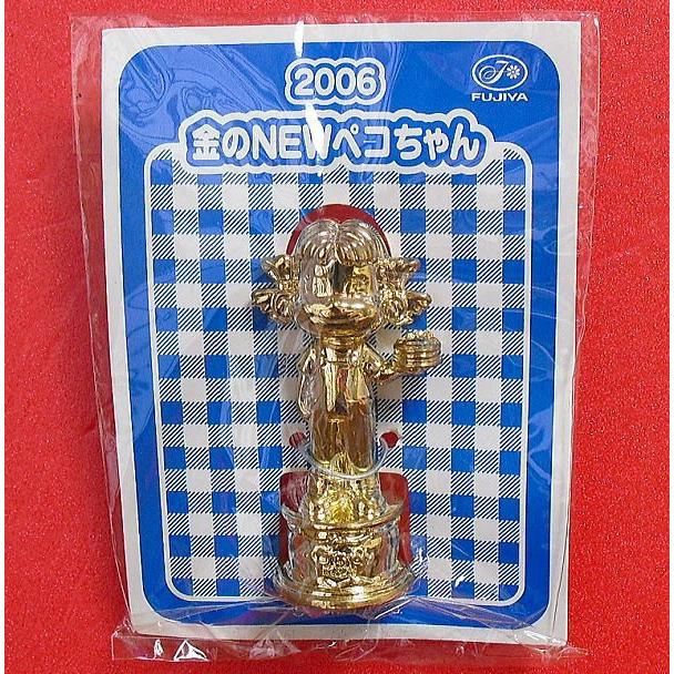 不二家「ペコちゃん」2006金のNEWペコちゃん : ザ・逸品堂 
