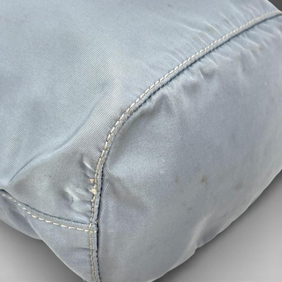 PRADA（プラダ） ブルー ナイロン 巾着 ミニポーチ : tibi TRUNK