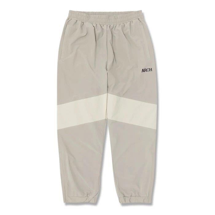 Arch rising track pants【B224115】sandshell | 