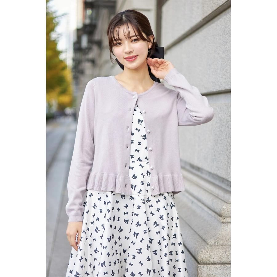 tocco closet（トッコ クローゼット） パールボタン裾フリルニット