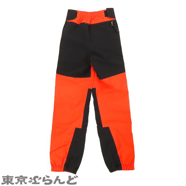 GUCCI グッチ ノースフェイス コラボ ナイロン パンツ オレンジx GUCCI グッチ ノースフェイス コラボ ナイロン パンツ オレンジx