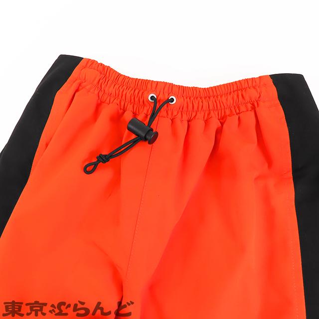 GUCCI グッチ ノースフェイス コラボ ナイロン パンツ オレンジx GUCCI グッチ ノースフェイス コラボ ナイロン パンツ オレンジx