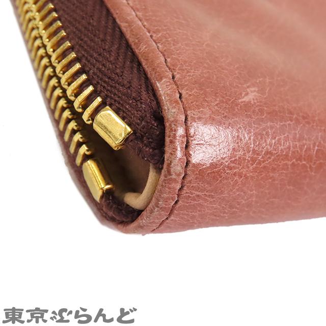 美品 プラダ ラウンドファスナー リボン 1M0506 レザー サフィアーノレザー ペオニア 1211 長財布【中古】PRADA PRADA（プラダ） リボン ラウンドファスナー サフィアーノ 1M0506