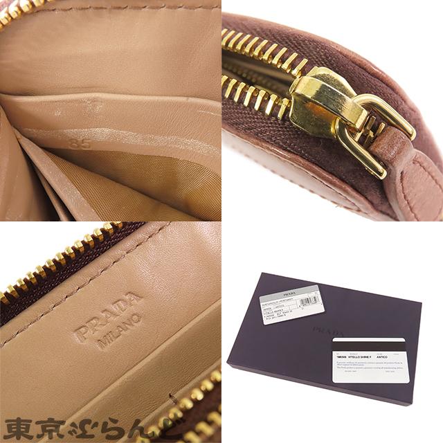 新品同様 プラダ リボン 1M0506 サフィアーノレザー ゴールド金具 レッド ラウンドファスナー 長財布 1480【中古】PRADA 楽天市場】新品同様 プラダ リボン 1M0506 サフィアーノレザー