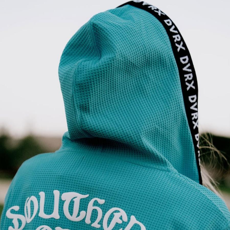 DEVEREUX GOLF デバローゴルフ WOMEN Southern DrawワッフルFull Zipロゴテープフーディー 763572178 ゴルフ レディース パーカー ブラウン アクア | DEVEREUX GOLF | 09