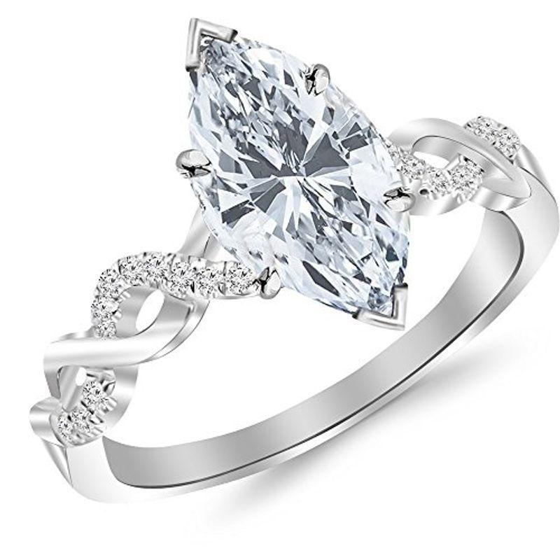 0.5 Carat Twisting Infinity Gold and Diamond Split Shank Pave Set Diamond Engagement Ring with a 0.35 Carat J-K I2 Center 