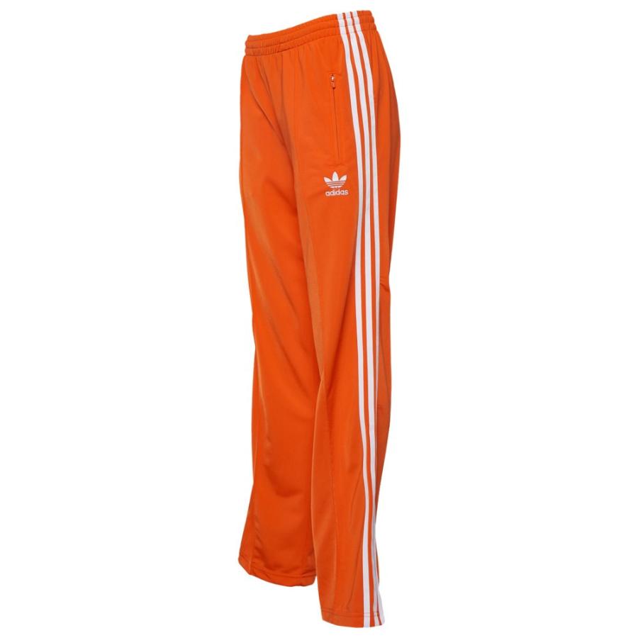 orange adidas track pants