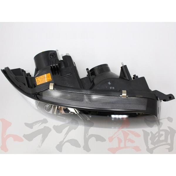 日産（NISSAN） キセノンヘッドライト ハウジング 運転席側