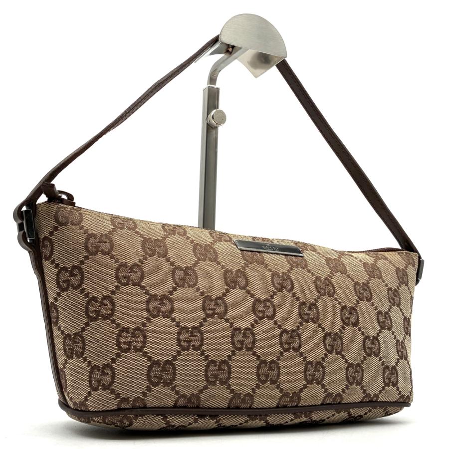 GUCCI グッチ　アクセサリーポーチ　GGキャンバス　ロゴ　ハンドバッグ 未使用保管品 グッチ GUCCI アクセサリーポーチ ハンドバッグ GG柄 GG