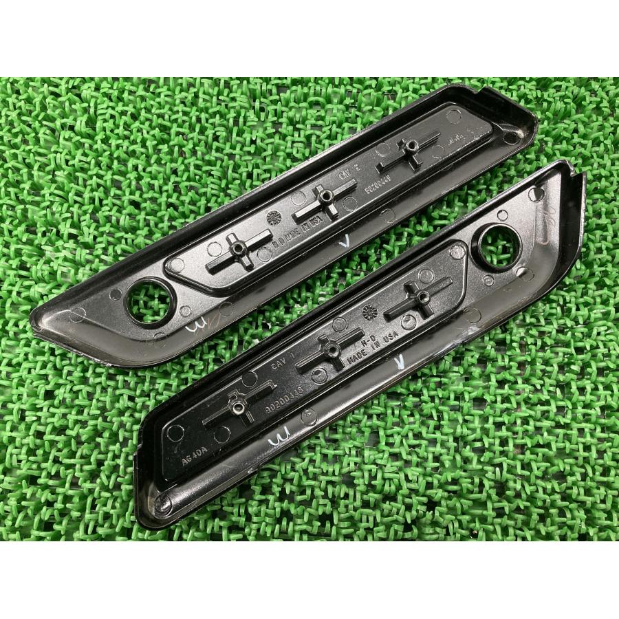 FLTRXS1750 サドルバッグラッチカバー 左右 黒M 90200448/90200449