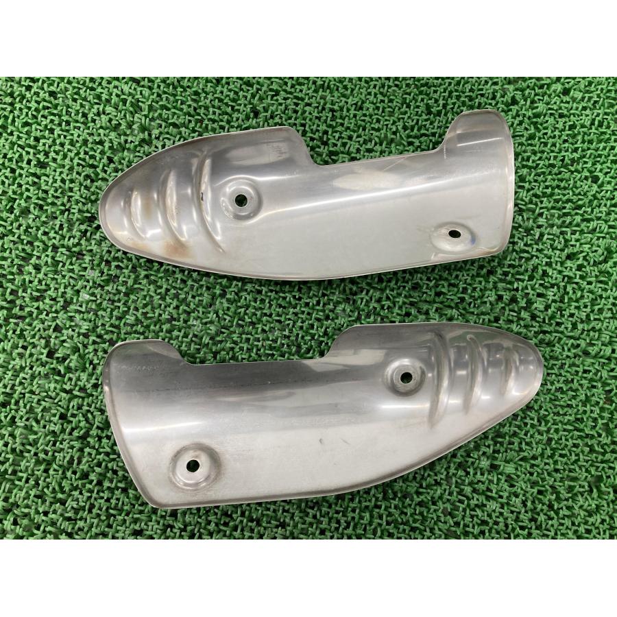 スピードトリプル1050 マフラーヒートガード 左右 トライアンフ(TRIUMPH) 純正 中古 トライアンフ TRIUMPH SpeedTriple1050 05−07年 78の画像