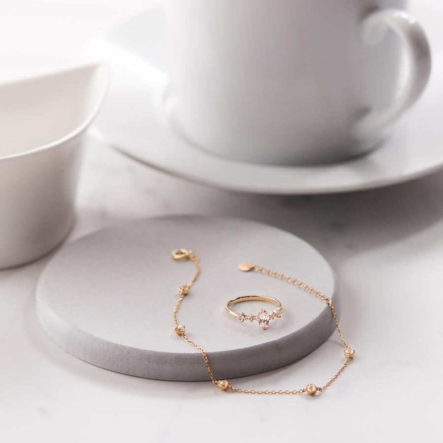 ジュエリーツツミ K10イエローゴールドホワイトトパーズブレスレット