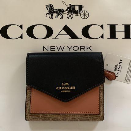 COACH コーチ カラーブロック×シグネチャー