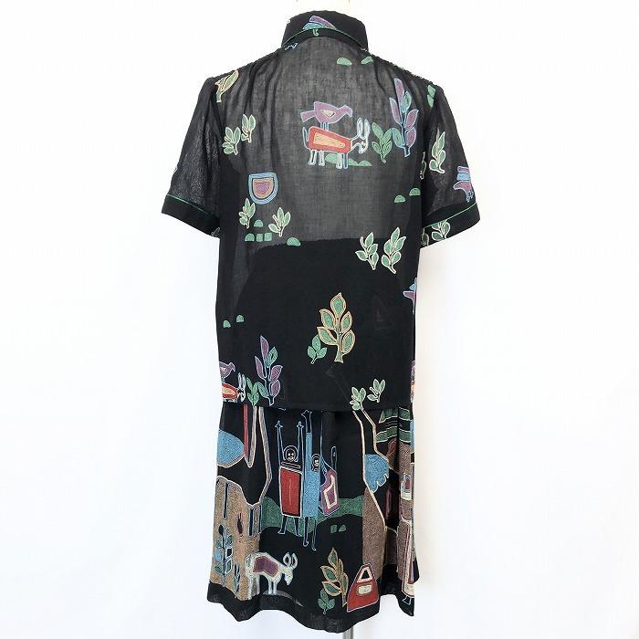 デルマーレ DEL MARE 薄手 セットアップ 上下セット 半袖シャツ×スカート 透け感 スカート裏地付き 民族柄 イラスト 黒 レディース |  | 01