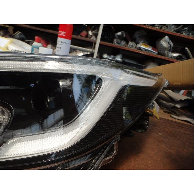 カローラツーリング 6AA-ZWE215W ヘッドライト左 LH ハイブリッド G 