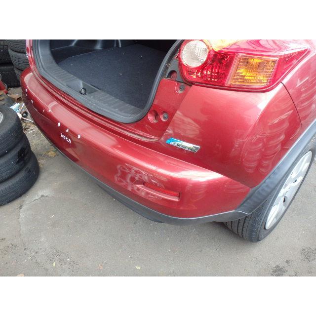ジューク DBA-YF15 リアバンパー 1500 15RX HR15-DE NAH 赤 85022  