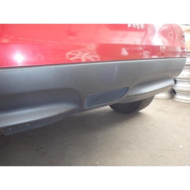 ジューク DBA-YF15 リアバンパー 1500 15RX HR15-DE NAH 赤 85022  