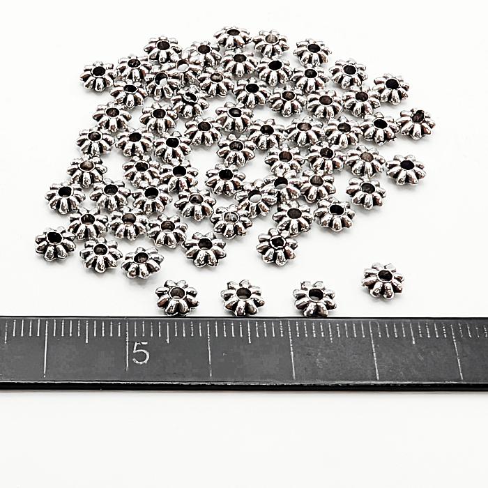 スペーサービーズ 花 5mm〜5.5mm 約60個 アンティークシルバー色