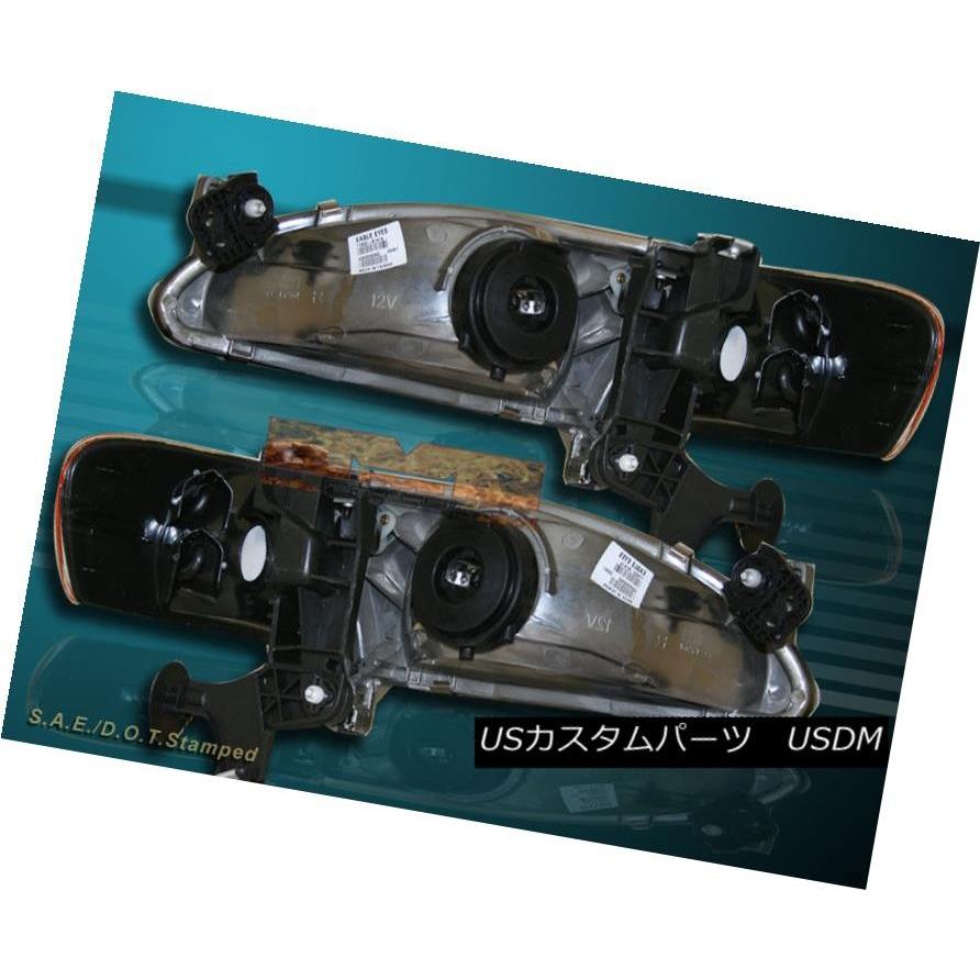 ヘッドライト 98-00 TOYOTA COROLLAブラッククリアヘッドランプ+アンバーコーナーリフレクター 98-00 TOYOTA COROLLの画像