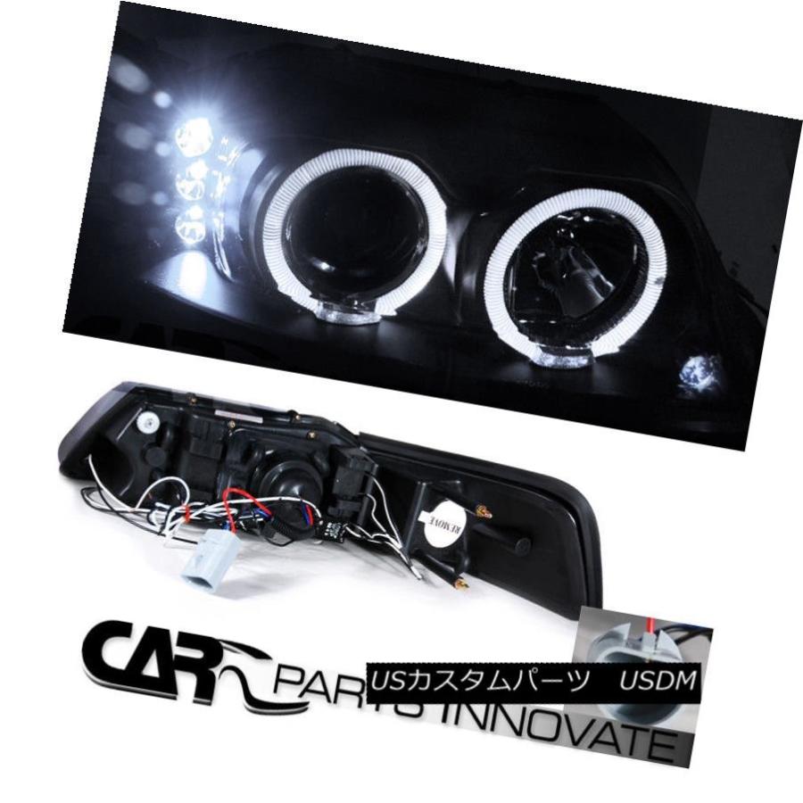 ヘッドライト 99-04 Ford Mustangブラックデュアルハロープロジェクターヘッドライト+ 6-L   EDバンパーの画像