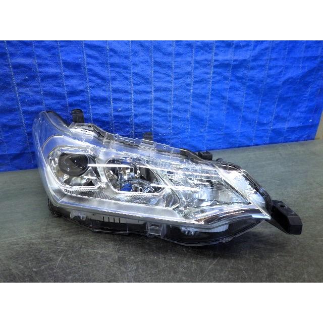 2219 カローラアクシオ NZE161 後期 右ライト ハロゲン 12-595 K