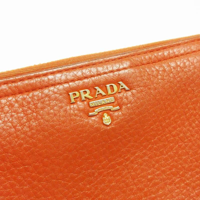 PRADA ラウンドジップレザー財布 オレンジ