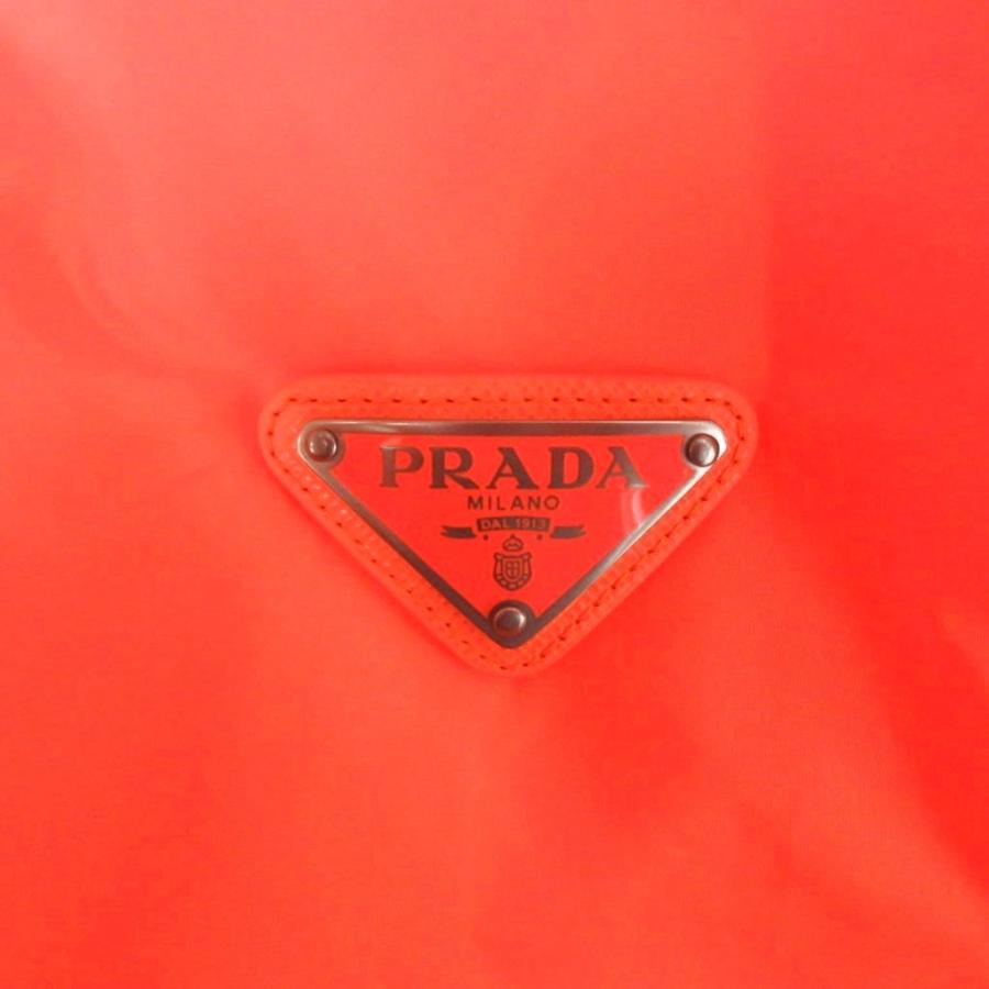 PRADA サンバイザー オレンジ ロゴプレート PRADA（プラダ） マウンテンパーカー ジャケット 長袖 三角プレート