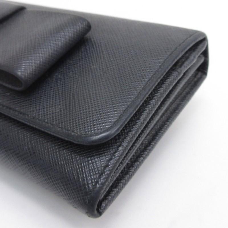 未使用　PRADA サフィアーノレザー 長財布 ブラック　エンボスロゴ　黒 PRADA（プラダ） サフィアーノレザー ロゴ 長財布 リボン ブラック