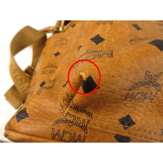 エムシーエム MCM スタッズ バックパック リュック ロゴプリント 茶色 