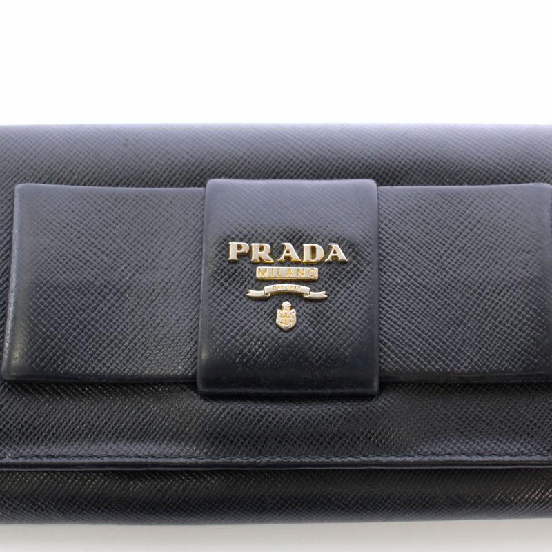 美品✨ PRADA プラダ　二つ折り 長財布　サフィアーノ 黒　ブラック リボン PRADA プラダ 長財布 二つ折り財布 サフィアーノ レザー リボン