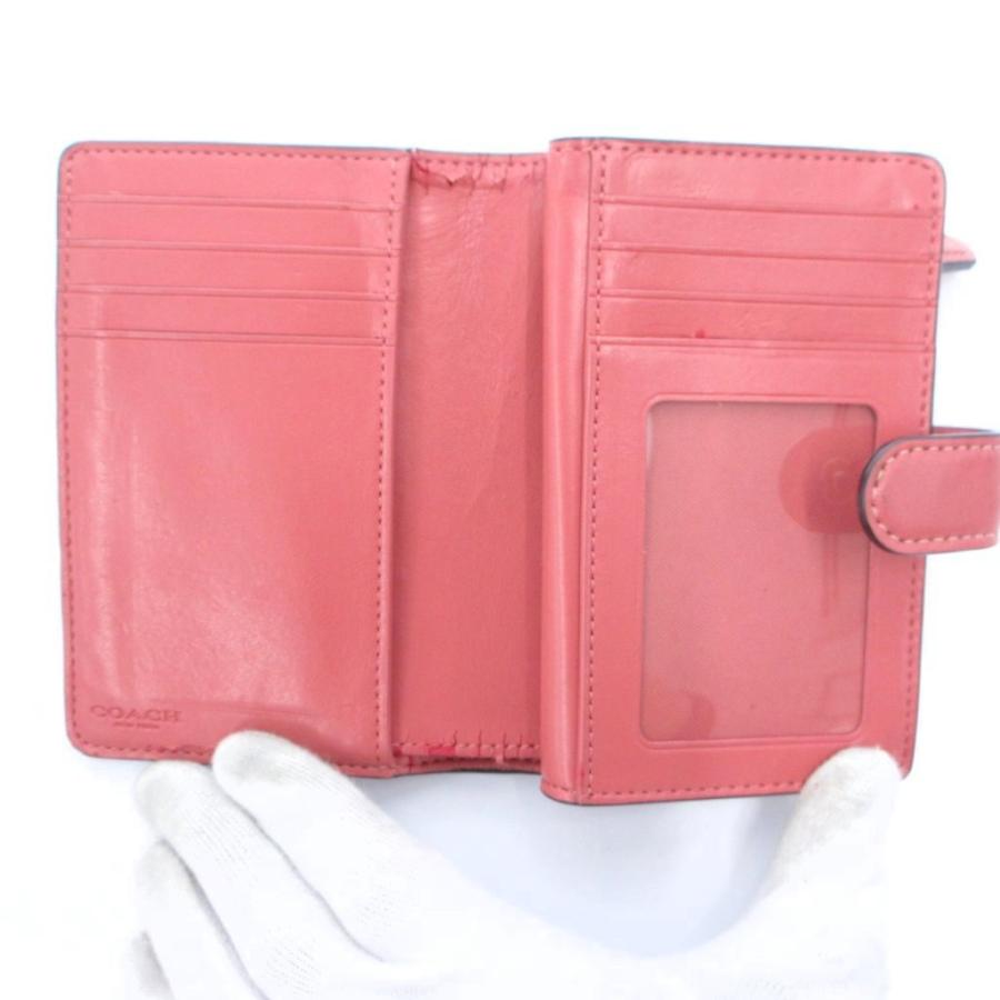 Coach 二つ折り財布 ピンク/ベージュ COACH（コーチ） 二つ折り財布 女性用 ベージュ ピンク シグネチャー柄