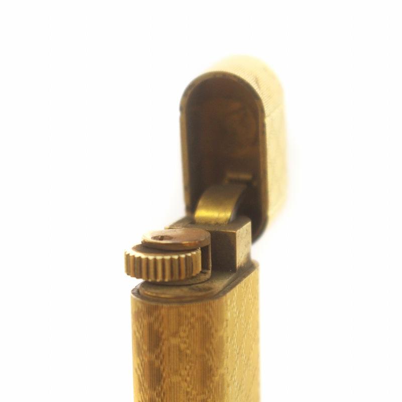 Cartier - カルティエ ガスライター 喫煙具 小物 タバコ ロゴ べっ甲柄 火花確認済み Cartier カルティエ ガスライター 喫煙具 小物 タバコ 総柄 ロゴ