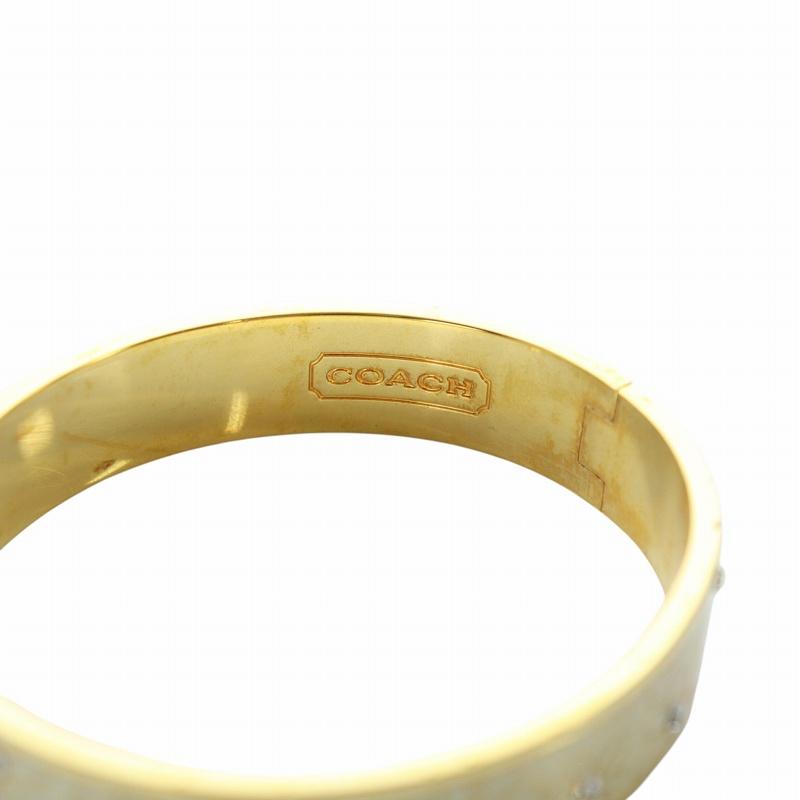 COACH バングル ゴールドカラー ラインストーン COACH（コーチ） バングル ブレスレット アクセサリー ロゴ 花柄