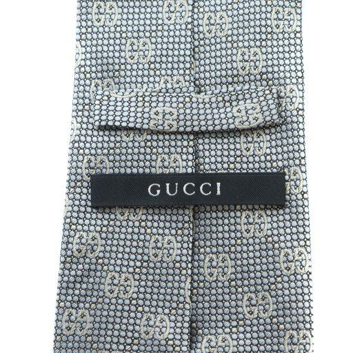 GUCCI（グッチ） ネクタイ レギュラータイ 絹 シルク ロゴ 総柄 グレー