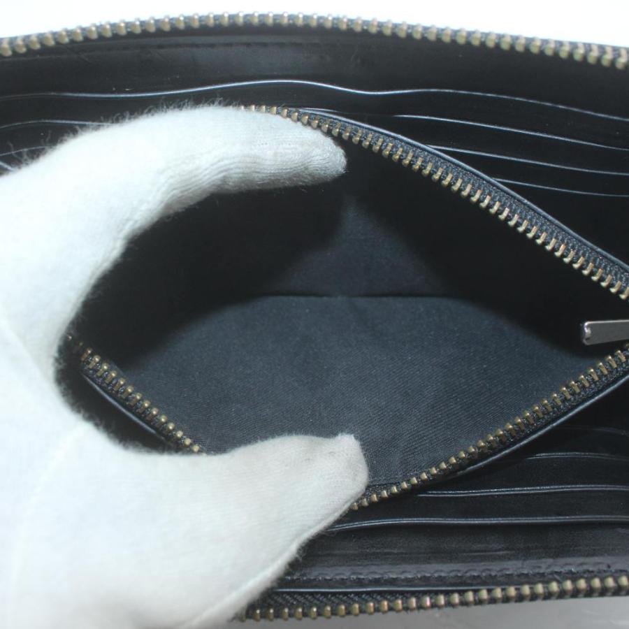 COACH（コーチ） 長財布 PVC レザー ラウンドファスナー 花柄 プリント