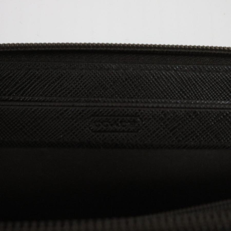COACH（コーチ） 長財布 PVC レザー ラウンドファスナー シグネチャー