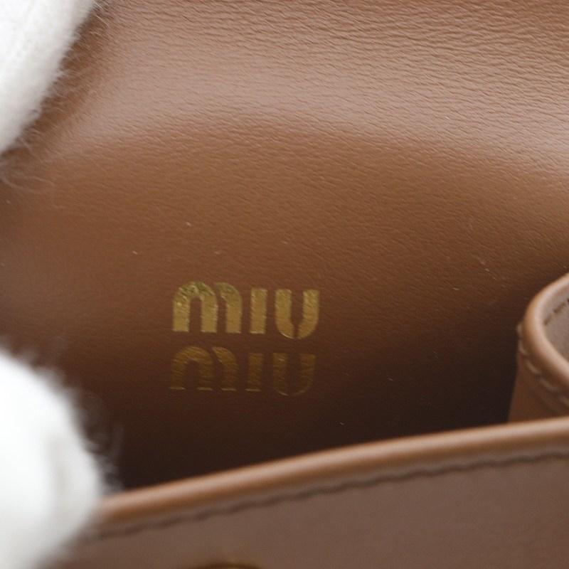 miu miu（ミュウミュウ） レザーxコード トリック ミニポーチ付き