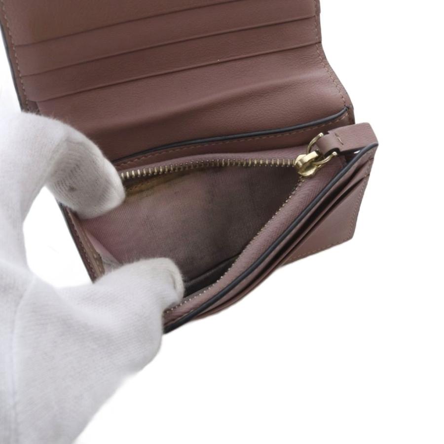 ヴァレンティノ ロックスタッズ コンパクトウォレット 財布 二つ折り ピンク VALENTINO - ヴァレンティノ VALENTINO スタッズ ロゴ コンパクト