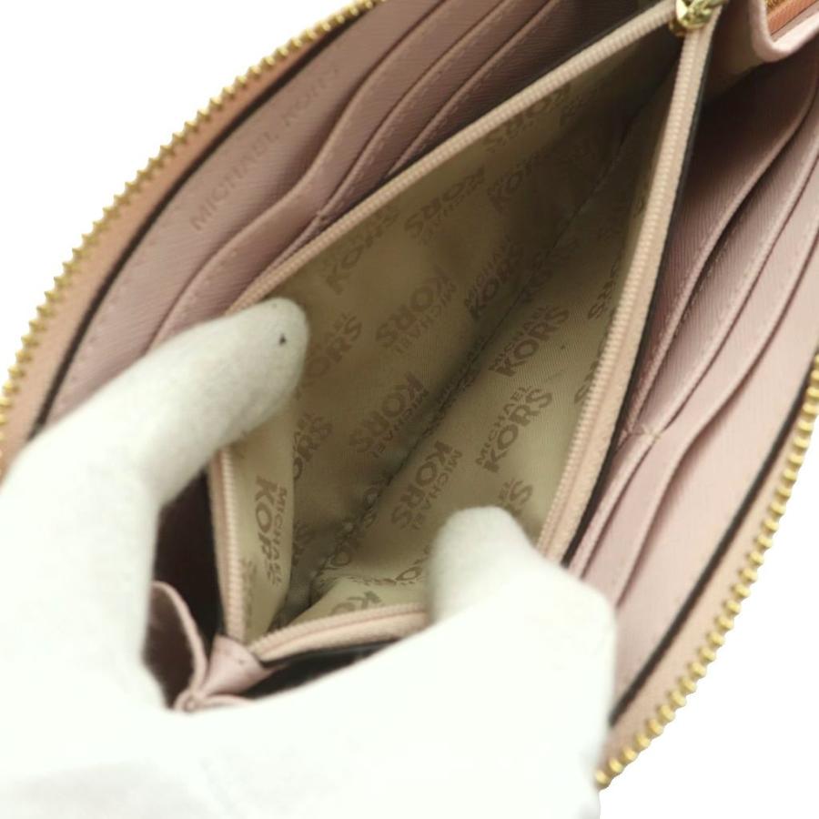 マイケルコース MICHAEL KORS スタッズ付きラウンドファスナー長財布