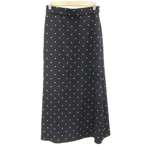 黒の水玉模様スカート 黒の水玉スカートコーデで自分らしい魅力が開花